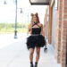 what to wear to a summer concert black tutu shorts black bodysuit and black chain boots